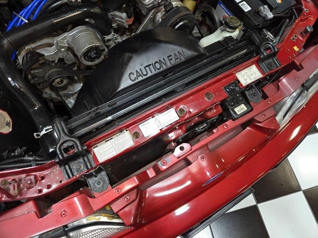 Photo of 1990 Red Ford Mustang