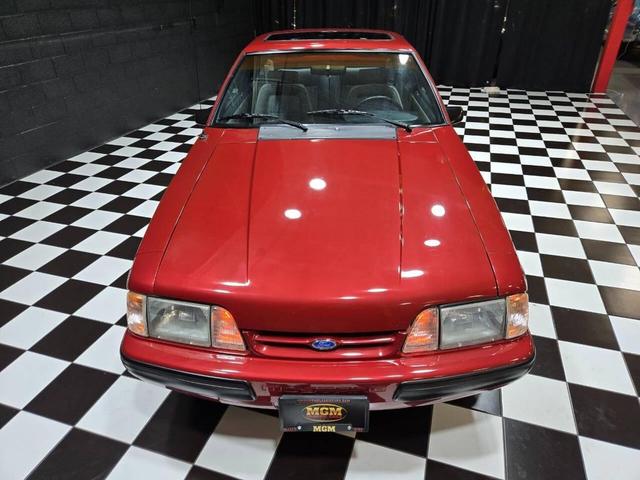 Photo of 1990 Red Ford Mustang