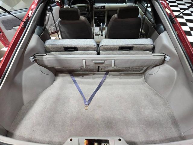 Photo of 1990 Red Ford Mustang