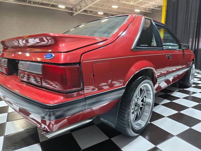 Photo of 1990 Red Ford Mustang