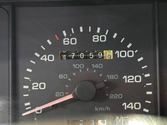 Photo of 1990 Red Ford Mustang