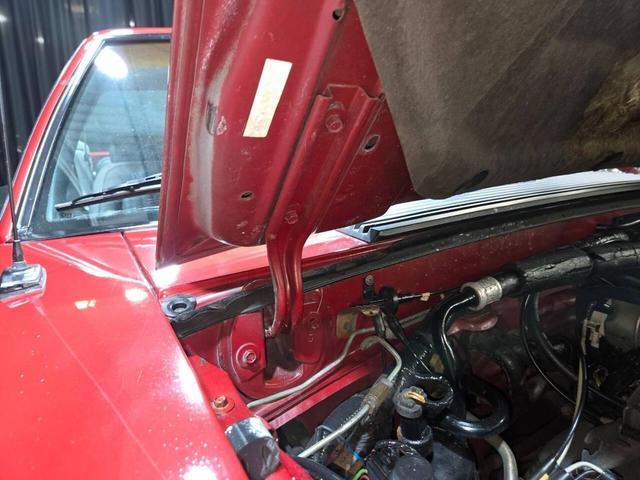 Photo of 1990 Red Ford Mustang