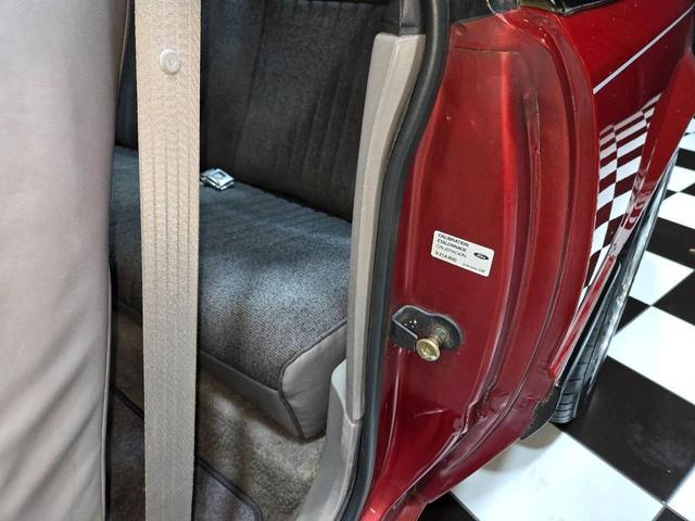Photo of 1990 Red Ford Mustang