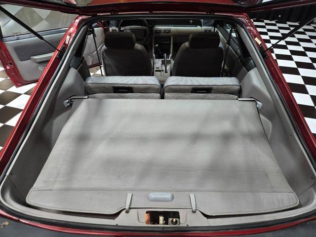 Photo of 1990 Red Ford Mustang