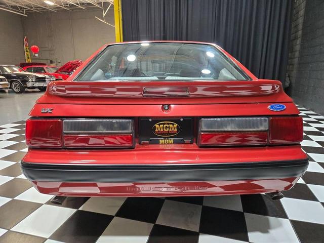 Photo of 1990 Red Ford Mustang