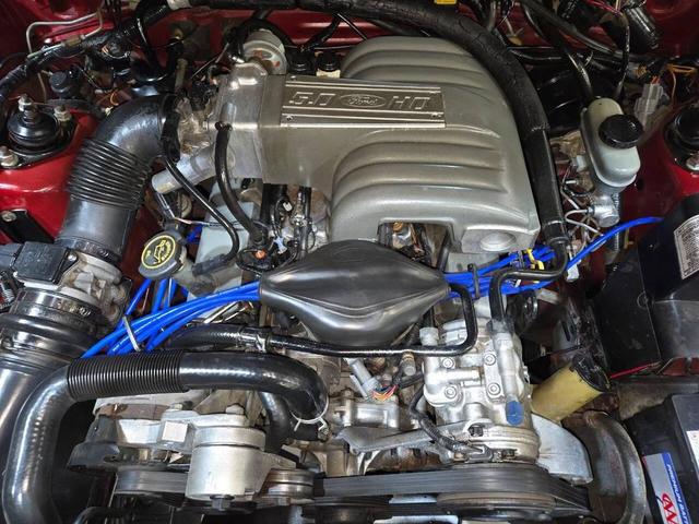 Photo of 1990 Red Ford Mustang