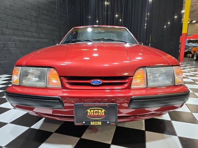Photo of 1990 Red Ford Mustang