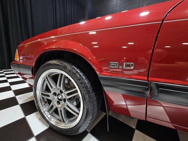 Photo of 1990 Red Ford Mustang
