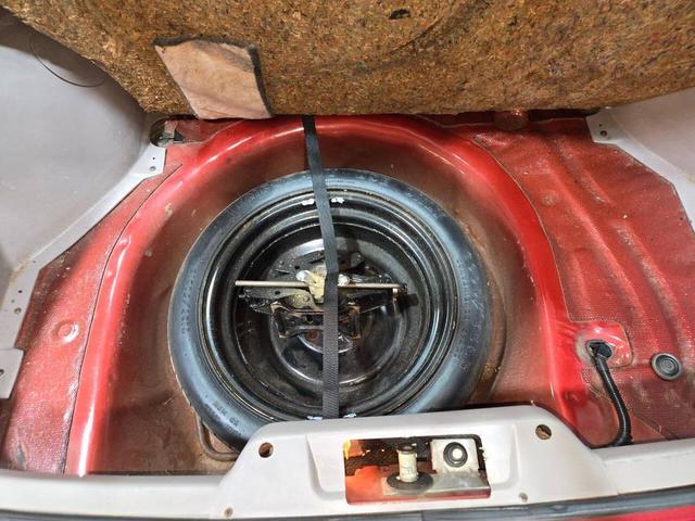 Photo of 1990 Red Ford Mustang