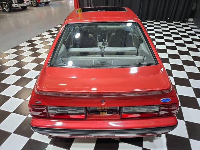 Photo of 1990 Red Ford Mustang