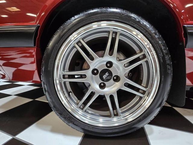 Photo of 1990 Red Ford Mustang