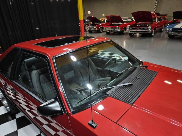 Photo of 1990 Red Ford Mustang