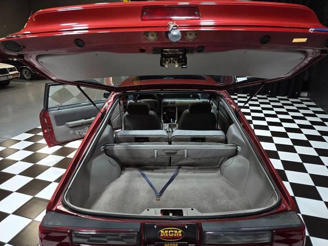 Photo of 1990 Red Ford Mustang
