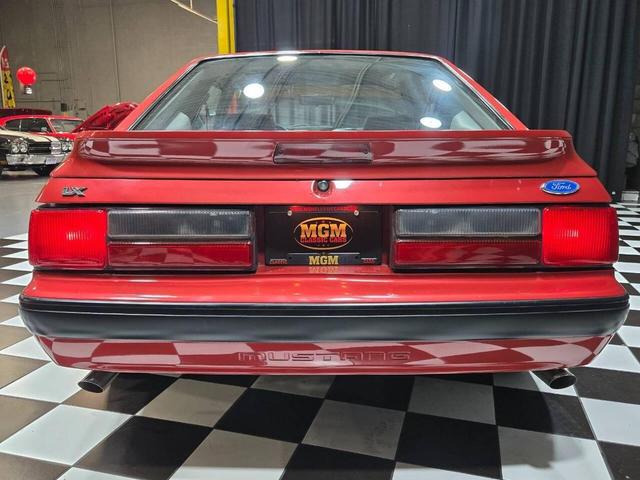Photo of 1990 Red Ford Mustang