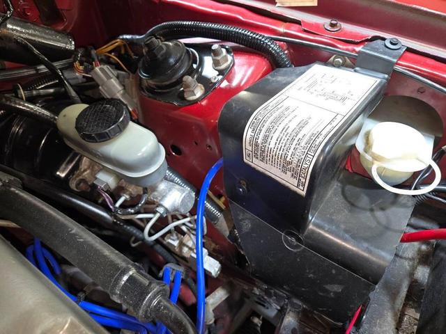 Photo of 1990 Red Ford Mustang