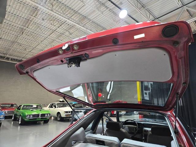 Photo of 1990 Red Ford Mustang