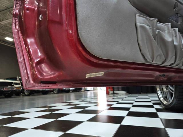 Photo of 1990 Red Ford Mustang