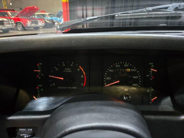 Photo of 1990 Red Ford Mustang