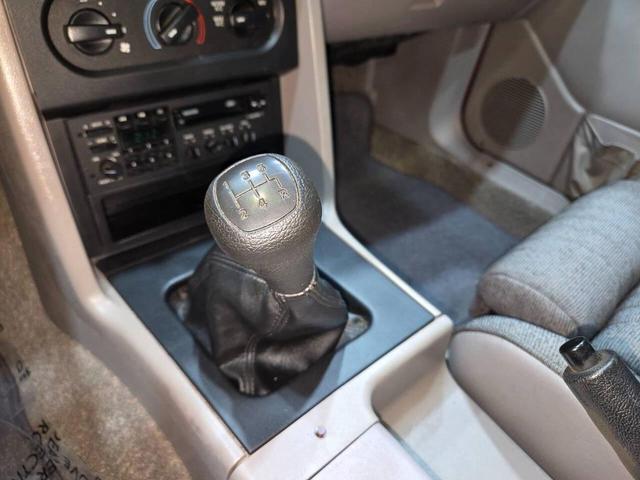 Photo of 1990 Red Ford Mustang
