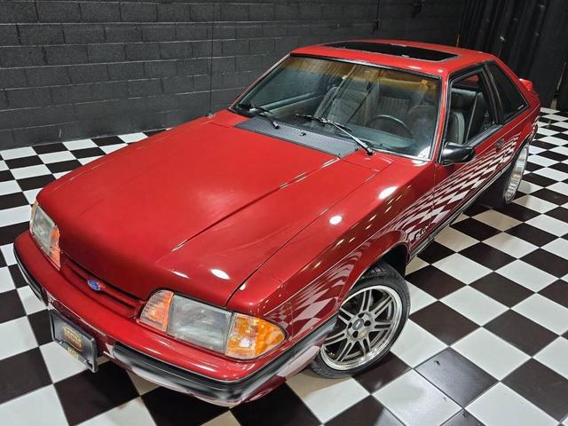 Photo of 1990 Red Ford Mustang