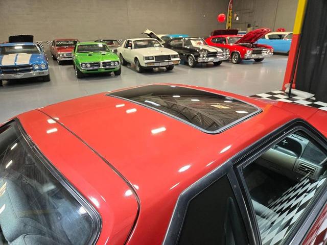 Photo of 1990 Red Ford Mustang