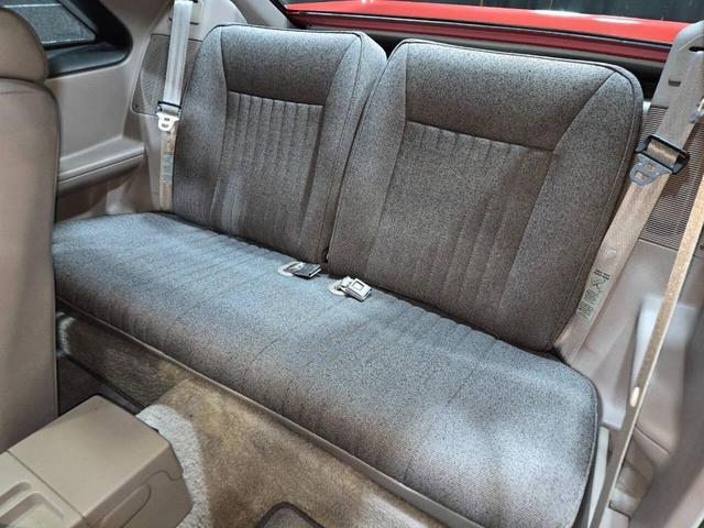 Photo of 1990 Red Ford Mustang