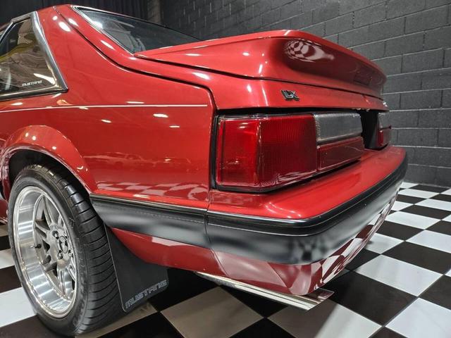 Photo of 1990 Red Ford Mustang