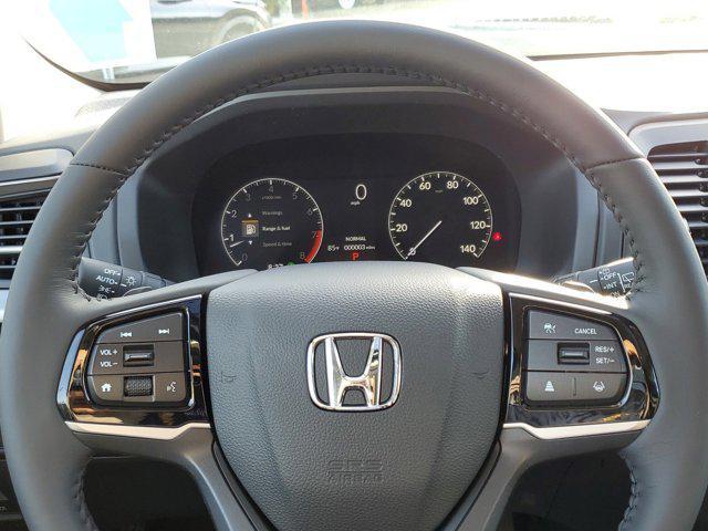 Photo of 2025 Crystal Black Pearl Honda Odyssey