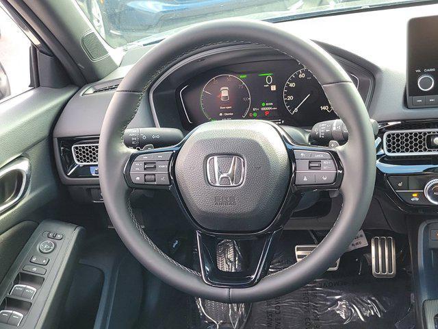 Photo of 2025 Platinum White Pearl Honda Civic Hybrid