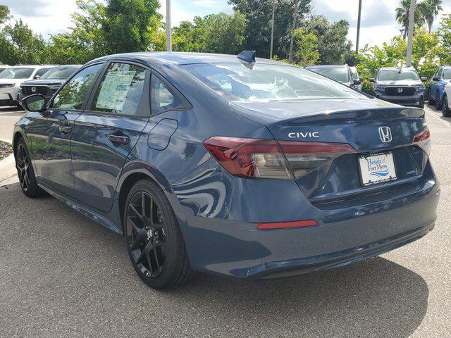 Photo of 2025 Boost Blue Pearl Honda Civic Hybrid