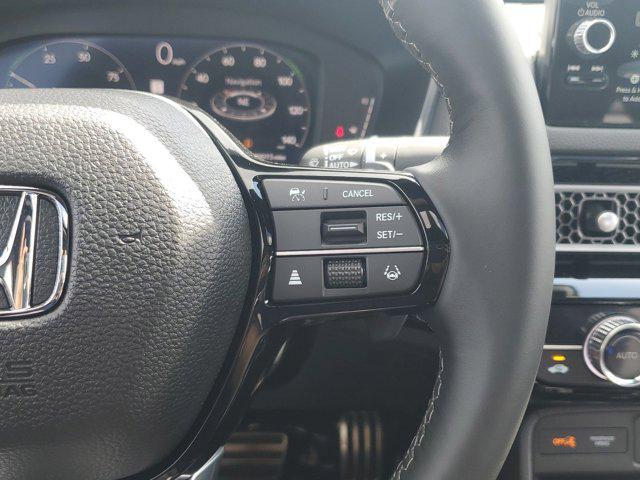 Photo of 2025 Boost Blue Pearl Honda Civic Hybrid