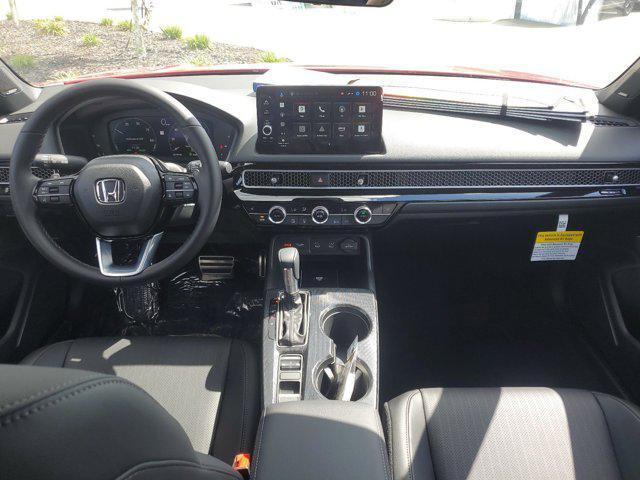 Photo of 2025 Boost Blue Pearl Honda Civic Hybrid