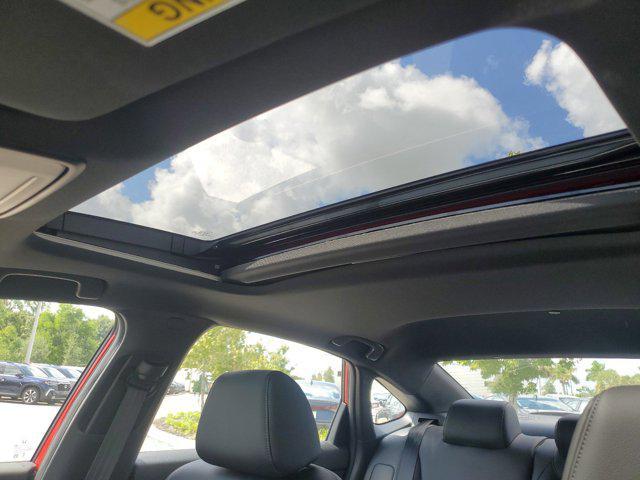 Photo of 2025 Boost Blue Pearl Honda Civic Hybrid