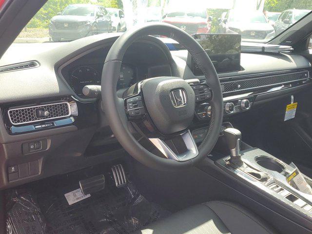 Photo of 2025 Boost Blue Pearl Honda Civic Hybrid