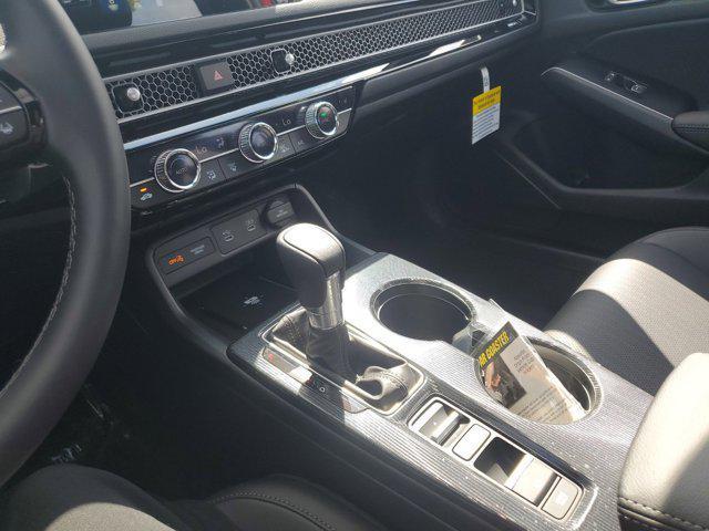 Photo of 2025 Boost Blue Pearl Honda Civic Hybrid