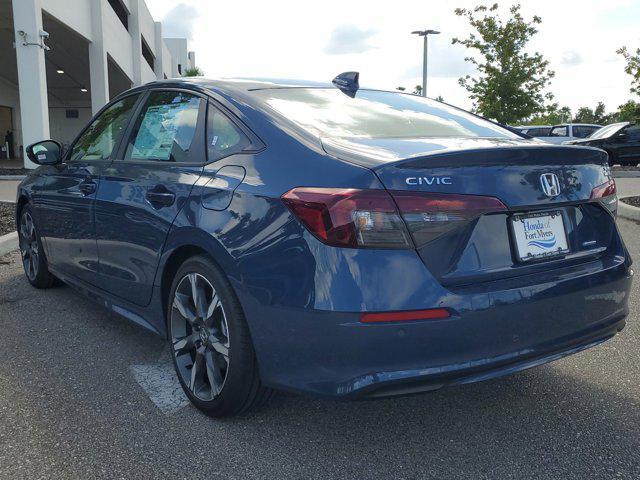 Photo of 2025 Boost Blue Pearl Honda Civic Hybrid