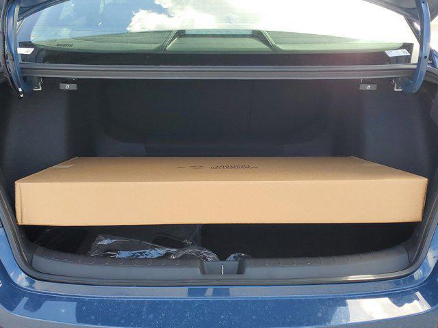 Photo of 2025 Boost Blue Pearl Honda Civic Hybrid