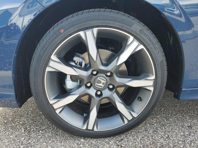 Photo of 2025 Boost Blue Pearl Honda Civic Hybrid