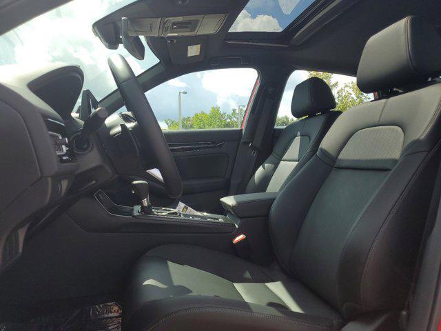 Photo of 2025 Boost Blue Pearl Honda Civic Hybrid