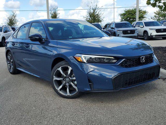 Photo of 2025 Boost Blue Pearl Honda Civic Hybrid
