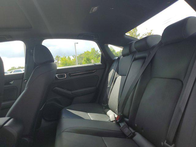 Photo of 2025 Boost Blue Pearl Honda Civic Hybrid