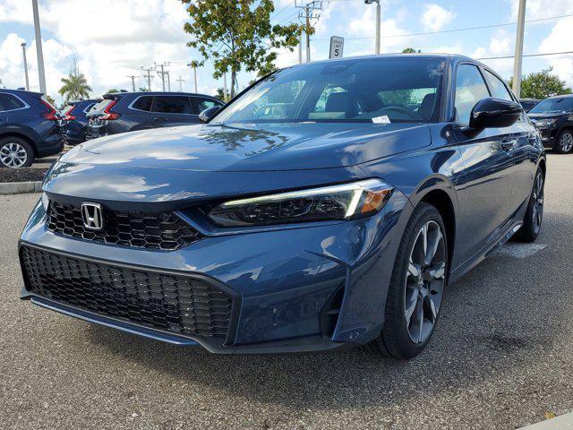 Photo of 2025 Boost Blue Pearl Honda Civic Hybrid