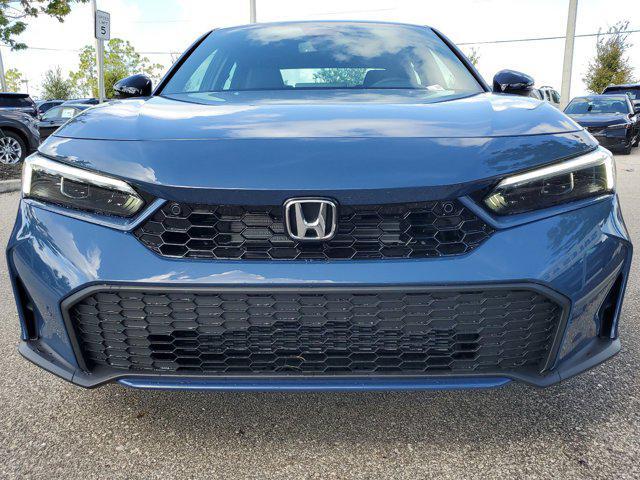 Photo of 2025 Boost Blue Pearl Honda Civic Hybrid