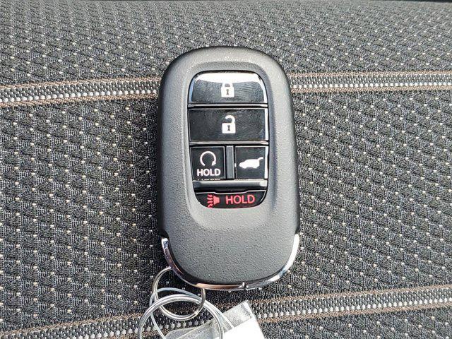 Photo of 2025 Radiant Red Metallic Honda CR-V Hybrid
