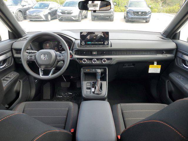 Photo of 2025 Radiant Red Metallic Honda CR-V Hybrid