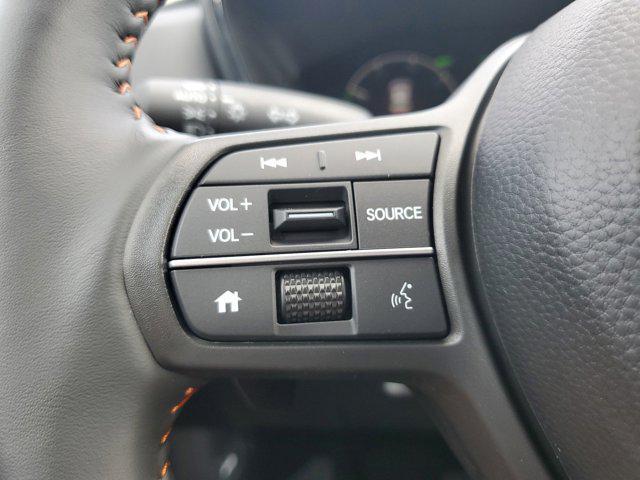 Photo of 2025 Radiant Red Metallic Honda CR-V Hybrid