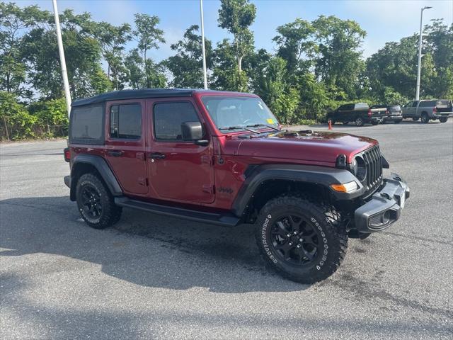 Photo of 2021 Snazzberry Pearlcoat Jeep Wrangler