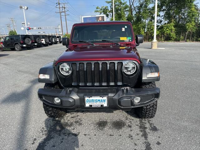 Photo of 2021 Snazzberry Pearlcoat Jeep Wrangler