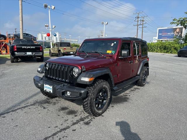 Photo of 2021 Snazzberry Pearlcoat Jeep Wrangler