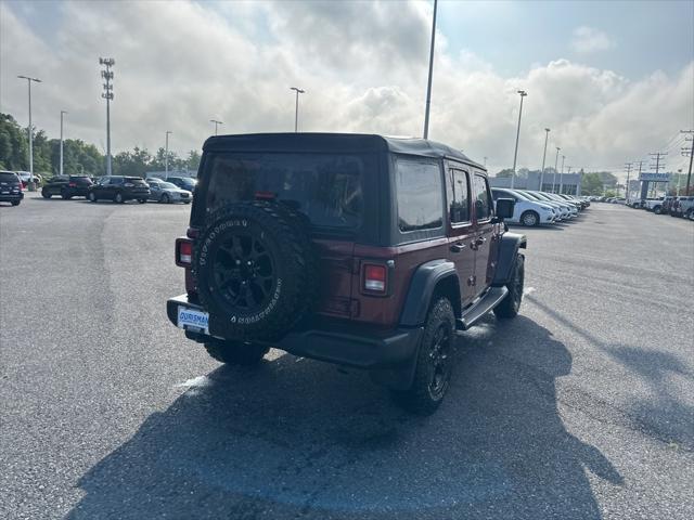 Photo of 2021 Snazzberry Pearlcoat Jeep Wrangler